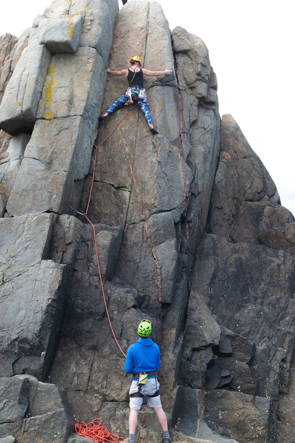 Chris Harvey watches as Nicky Pledger completes her first climb.  (Picture by Cassidy Jones, 29723946)