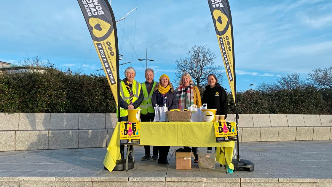 Bowel Cancer Guernsey gave away 240 bags and leaflets yesterday as part of a Loud Tie Day awareness drive. Left to right, chairwoman Anne Brouard, volunteer Malcolm Heath, director Dr Rachel Heath, treasurer Sara Gould and committee member Catharine Haywood. (32915168)