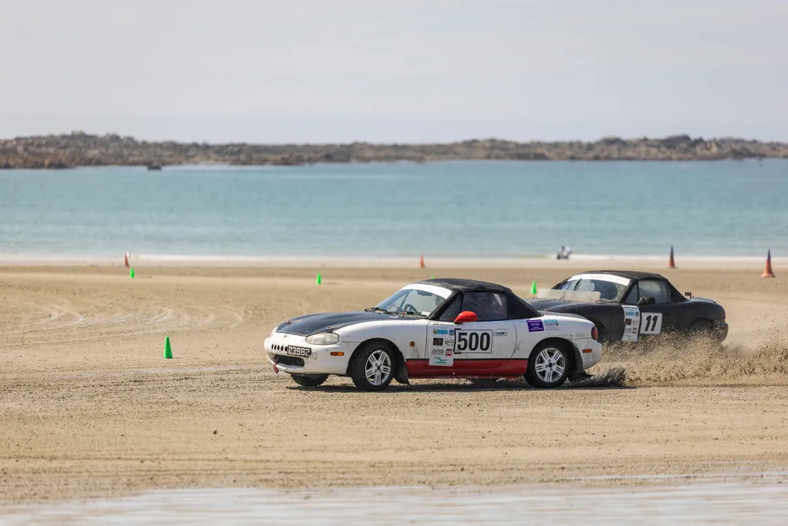 Aaron Pratt trying to hold off the challenge of Ashleigh Le Page.