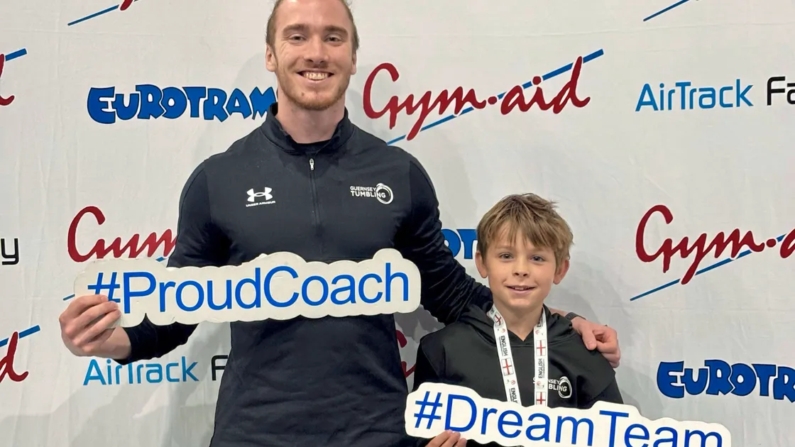 Proud coach Bobby Montague with English medallist Robbie Hill-Tout.