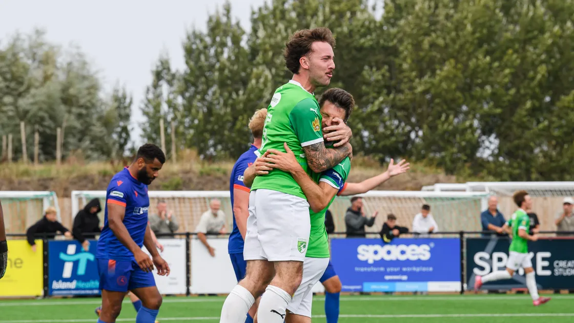 Ben Solway (left) and Ross Allen celebrate the former’s goal which secured a point for GFC against Midhurst and Easebourne on a blustery Saturday at Victoria Park.