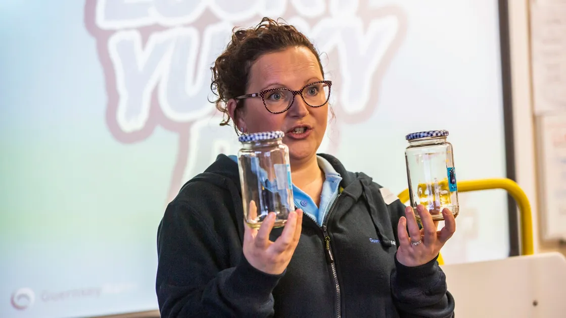 Catherine Boughay, Guernsey Water's communications officer, with some jars that it is leaving with the school to do a decomposition experiment. (28950979)