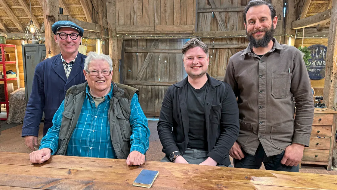 The Repair Shop bookbinder Chris Shaw, far left, and the programme's Dom Chinea. (Picture: BBC/Ricochet Ltd) (34360768)