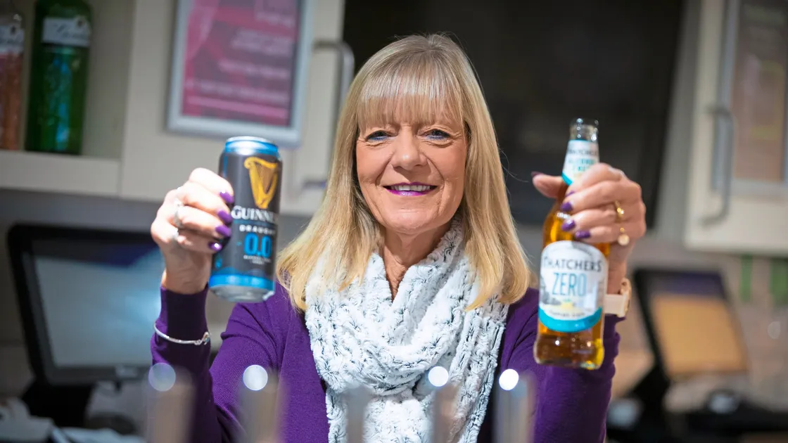 Health Improvement Commission substance use lead Andrea Nightingale holding two of the many low or no-alcohol drinks available for people who are attempting the Dry January challenge. (Picture by Peter Frankland, 32852146)