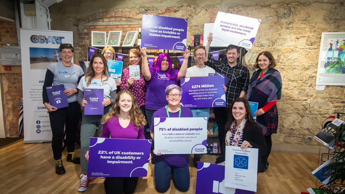 Purple Tuesday was marked yesterday at the Chamber of Commerce. Left to right, Lisa Vidamour, Hayley Phillips, Katie Bellingham, Nikki Ioannou-Droushiotis, Gill Evans, Carol Le Page, Karen Blanchford, Donovan Lowe, Ben Wratten, Kitty Stewart and Sarah Harvey. (Picture by Peter Frankland, 31433738)